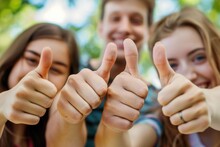 Three Cheerful Young Friends Showing Their Thumbs Up In What Seems To Be A Gesture Of Approval Or Success