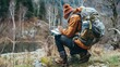 A backpacker taking a moment to write in a travel journal.