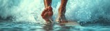 Fototapeta Miasto - close-up of a surfer's feet firmly planted on a surfboard, cutting through a wave with spray flying around