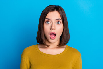 Canvas Print - Photo of charming impressed lady dressed shirt open mouth big eyes isolated blue color background