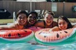 Pool party fun with friends posing playfully with watermelon floaties.