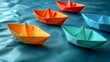 colorful origami ships on blue background