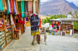Street with shop with clothes and other souvenirs in Karimabad, Pakistan.