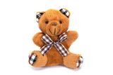 Fototapeta Desenie - Teddy bear doll isolated on white background. Brown Knitting wool bear toy with ribbon bow isolated