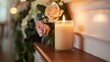 A baptismal candle displayed on a mantle or shelf as a keepsake after the ceremony. 