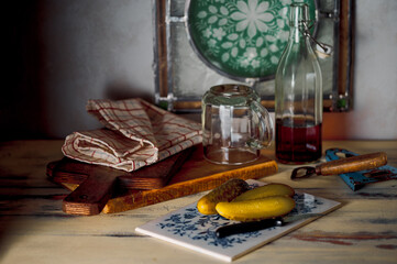 Wall Mural - Old-fashioned still life with pickled cucumbers