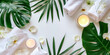 spa background banner  wellness and spa composition with towels, candle, tropical leaves and orchid flowers on white background