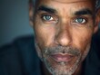 Stunning high resolution photographs of a 40 year old successful multiracial man with fantastic gray eyes who is the spokesperson for a successful company.Business