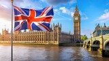Fototapeta Big Ben - Against London's skyline, the Union Jack waves in front of historic landmarks, epitomizing British heritage and unity. Invest in national identity.