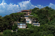 Beautiful houses and city streets of the southern city with green plants, public place in Turkey, on a summer sunny day