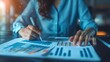 © Jelena - Businesswoman Analyzing Financial Report with Growth Chart, Accounting and Investment Concept, Digital Illustration