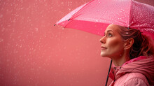 Woman With Pink Umbrella On Rainy Day