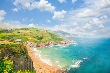 Itzurun beach and hills of Zumaia coast at summer, Pais Vasco