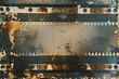 Close up of a rusty film strip. Suitable for vintage or grunge themed projects