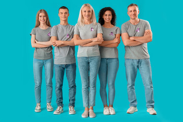 Poster - People with lavender awareness ribbons on blue background. World Cancer Day