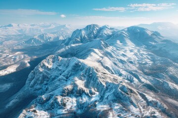 Aufkleber - Aerial view of a snowy mountain range. Suitable for travel and nature concepts