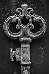 Aufkleber - A vintage key hanging on a door, suitable for various themes
