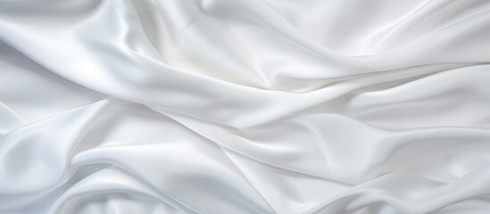 Poster - A close up of a white fabric featuring a vast array of intricate folds creating a textured pattern