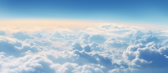 Canvas Print - A commercial aircraft is soaring high in the vast expanse of the sky dotted with fluffy white clouds