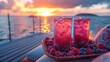 A tray of frozen berry smoothies on a poolside lounge chair, with colorful cushions and a view of the sunset over the water.