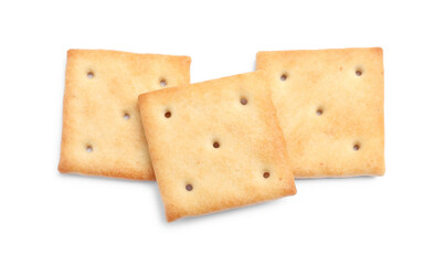 Wall Mural - Tasty crispy square crackers isolated on white, top view