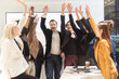 © tonjung - Teamwork concept,Business team standing hands together in the loft office.people joining for cooperation success business,win in every thing