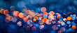 Luxurious burst of colorful confetti against a blurry blue and orange background