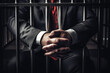 Businessman and politician corrupt oldman prisoner in orange uniform holds hands on metal bars, looking at camera. Standing, sitting behind prison bars.	
