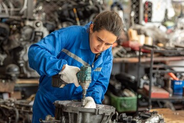 Wall Mural - auto professional mechanical technician garage motor car engine woman check automobile engine for diagnostic maintain transmission machine. technician worker auto in garage check engine car motor