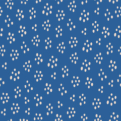 Poster - Cute white hand drawn polka dot on a blue  background.  Abstract brush spots seamless pattern.  Simple vector design for fabric, wallpaper, textile, wrapping paper, packaging.
