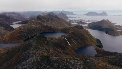 Wall Mural - Aerial view of Segla mountain above the sky, Norway during summer
