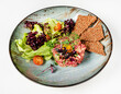 beef tartare with lettuce and bread