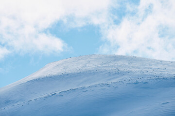 Wall Mural - Images from the area of Venabygdsfjellet Mountains with the Rondane National Park in late winter.