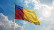 Large flag of Chad waving in the wind on flagpole agai
