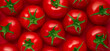 Tomato close up, red vegetable background, top view