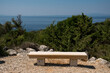 concrete bench with a view on mediterranean sea