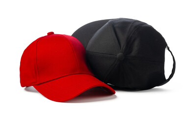 Wall Mural - Black and Red Baseball Caps on White Background