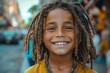 Happy smiling African American teenager boy with dreadlocks