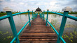 Tranquil Retreat: Gazebo Linked by Bridge Over Water
