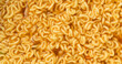 Instant noodles ramen close up top view background