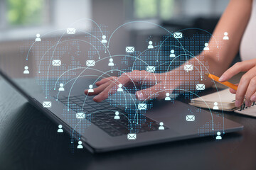 Wall Mural - woman typing on laptop at office workplace in background. concept of working process, internet surfi