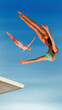 Poster. Contemporary art collage. Athlete women in swimwear and caps posing in mid air while jumped from platform to water. Concept of sport, active lifestyle, tournament. Retro effect, art style.