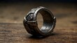 A heavy, battle-worn ring, scarred and dented, telling tales of countless wars and the bravery of its owner Generative AI