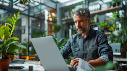 Poster - Man Working on Laptop at Table