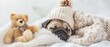 Tiny Pug puppy wearing winter hat, hugs favorite toy bear and sleeps under white warm blanket at home. Empty space for text
