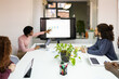 © ADDICTIVE STOCK - Diverse team analyzing sales data during meeting