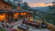 Cozy mountain cabin at sunset with outdoor seating and picturesque view.