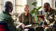 © Garnar - A Caucasian woman psychologist provides help to veterans, African American man in a diverse group therapy setting. Concept of ongoing mental health support for soldiers and veterans
