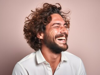 Poster - A man with a bright color shirt is smiling and laughing