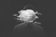 Surreal black and white concept man with cloud over head